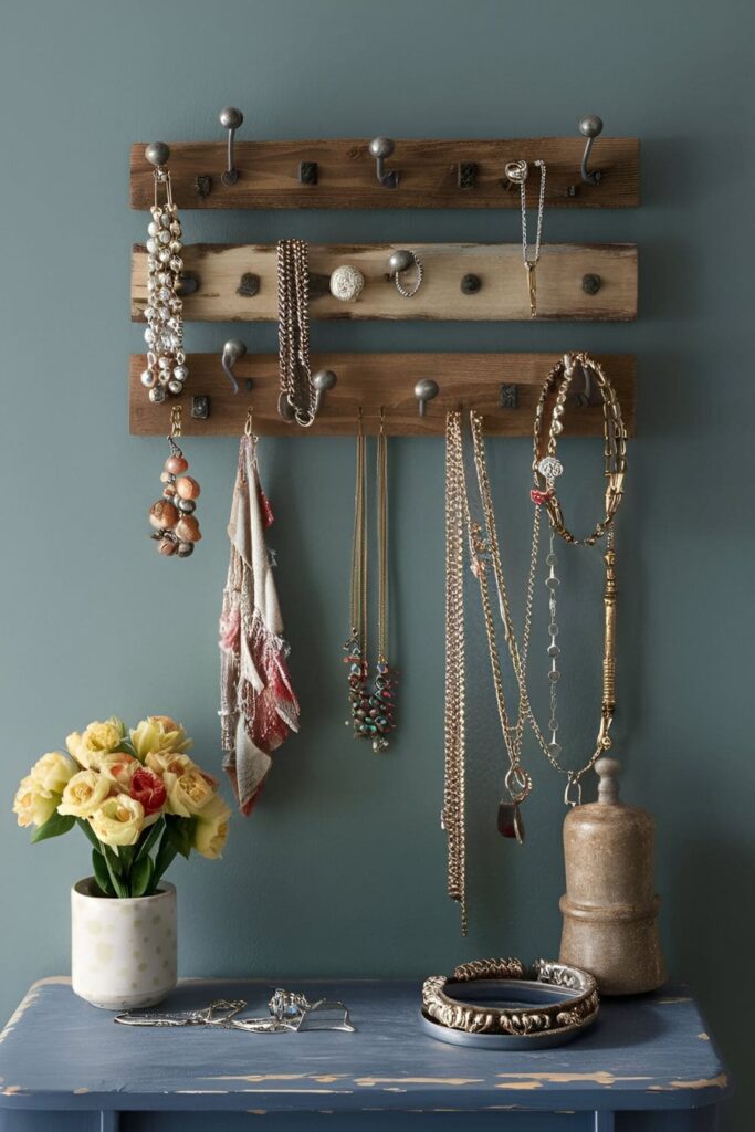 Jewelry organizer made from reclaimed wood with hooks and knobs for necklaces and bracelets