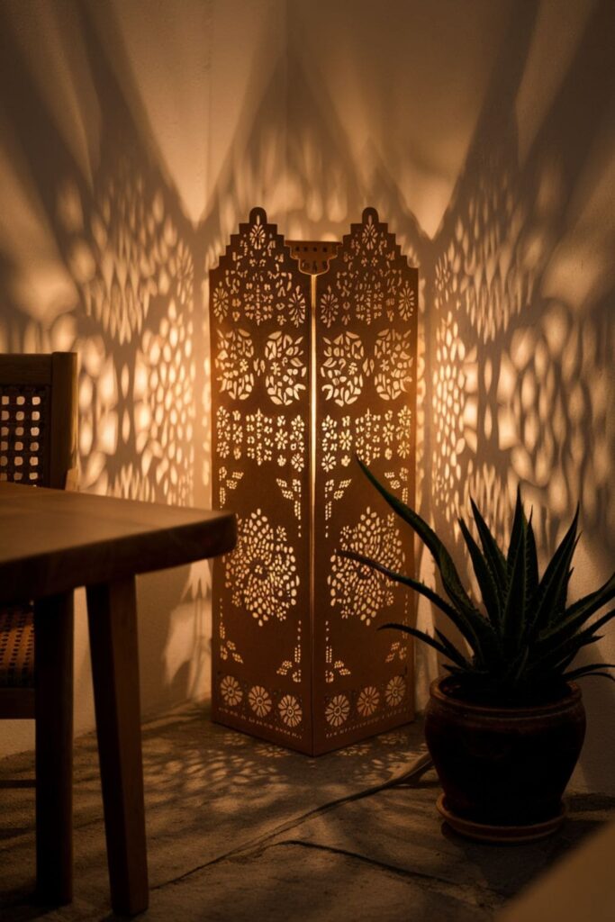 Decorative cardboard lampshade with intricate patterns cut into the cardboard, wrapped around a light fixture