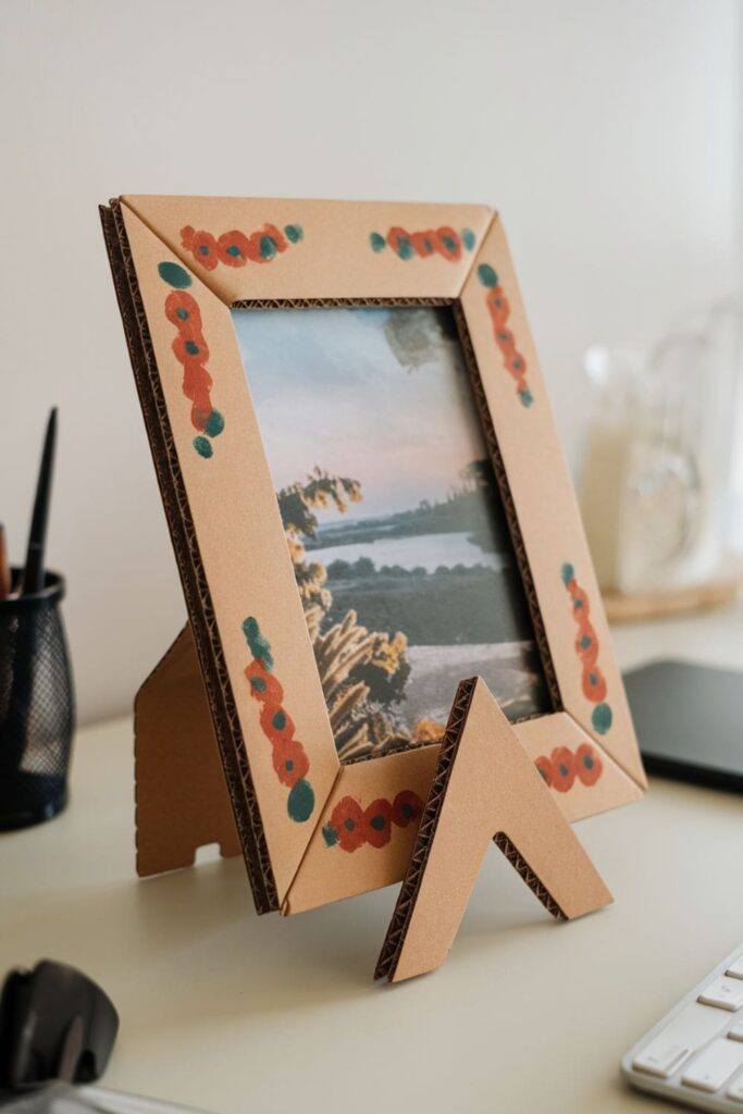 Stylish cardboard picture frame with a decorative design, holding a photo and supported by a triangular stand