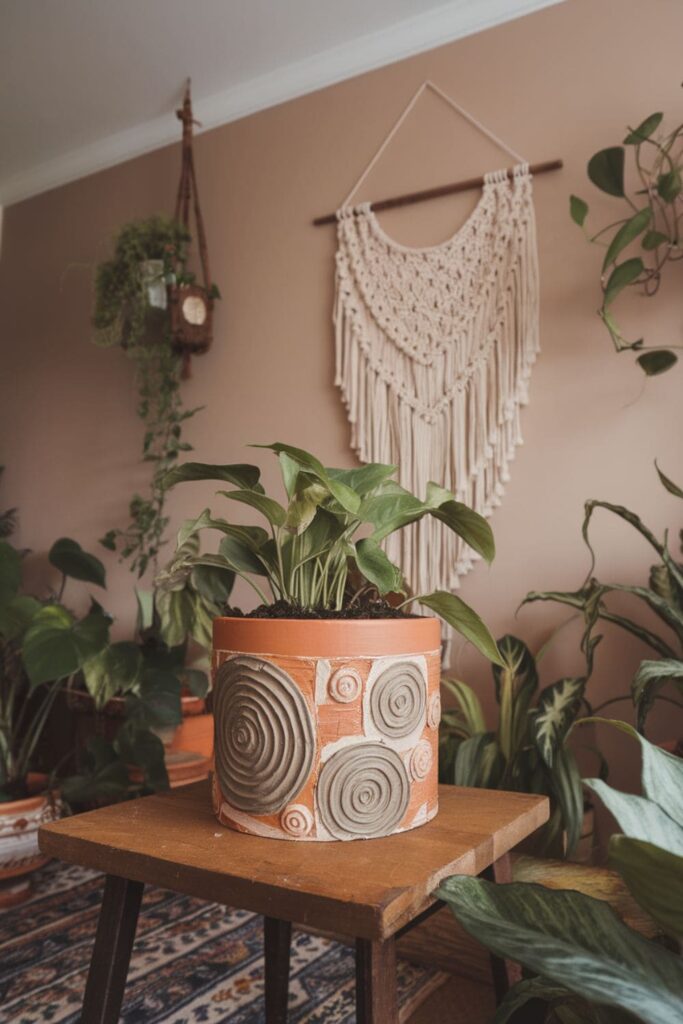 Hot glue plant pot wrap with textured patterns on a table