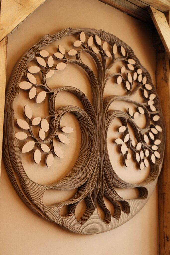 Layered cardboard Tree of Life with detailed branches and leaves