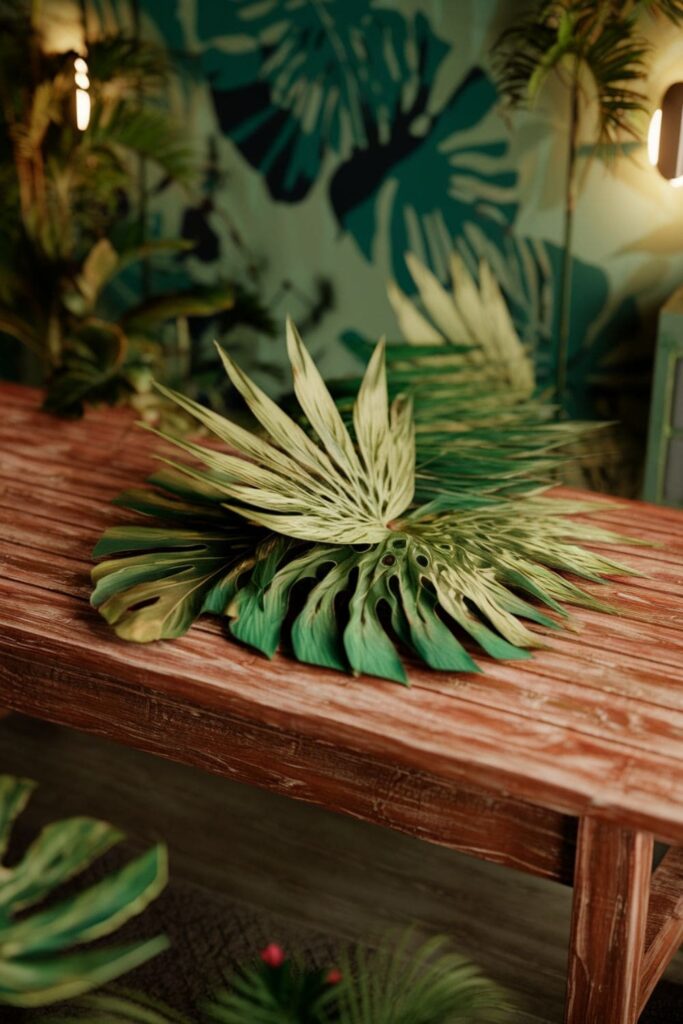 Layered hot glue tropical leaves in green tones on a rustic table